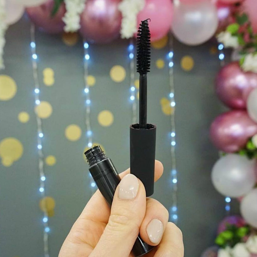 black mascara wand and tube